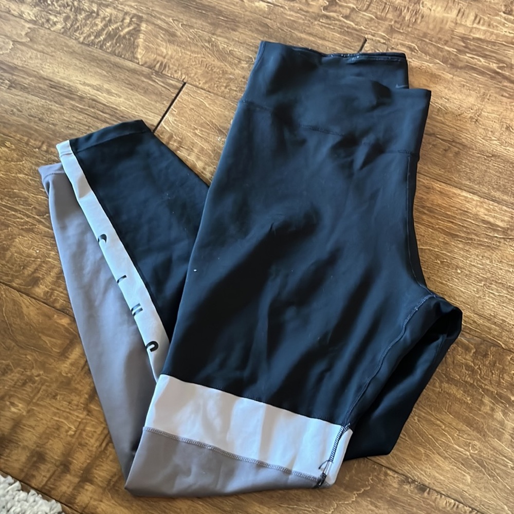 Okay condition womens Nike leggings. Some tiny holes along seams. Size large.